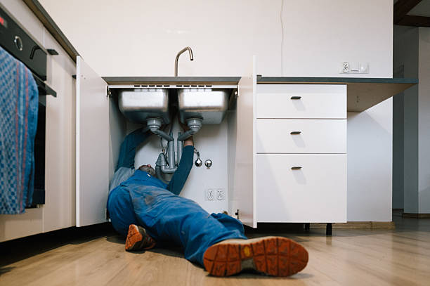 Professional Drain Cleaning technician working in Canton, MS